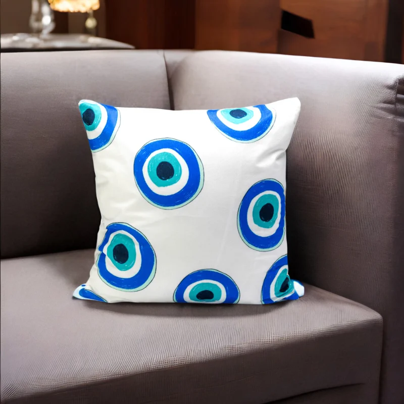 A Malda Cushion sitting on a couch.