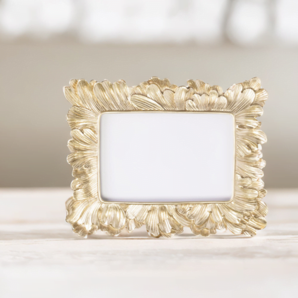 A Vintage Gold Frame picture frame on a table in London.