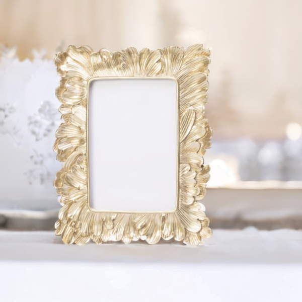 A gold frame adorned with leaves on a London table.