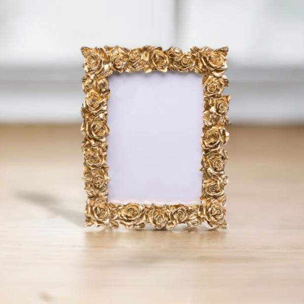 A gold rose photo frame adding elegance and charm to any space.