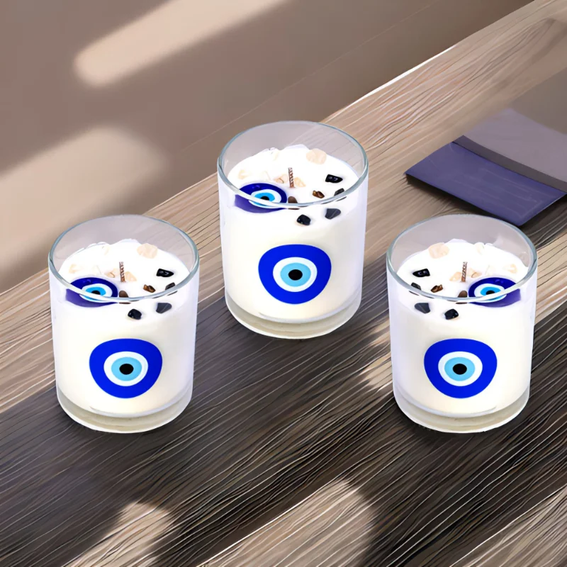 Three glass candles with evil eye designs, soy based, luxury