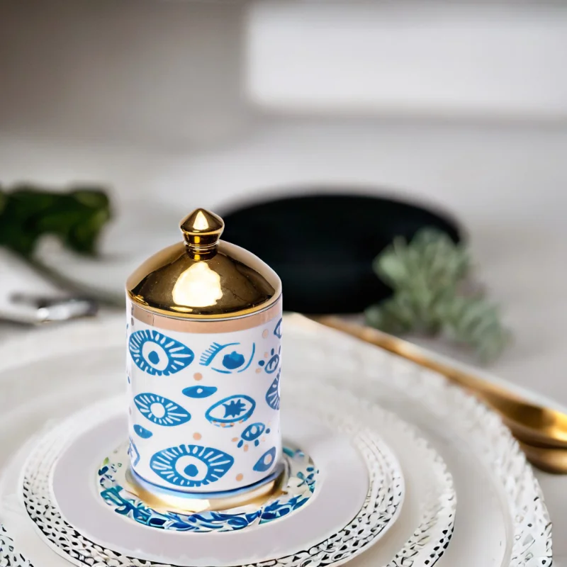 An Evil Eye Canister on a table setting.