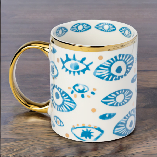 Luxury Blue and White Mug with Evil Eye Styling and Gold Accents.