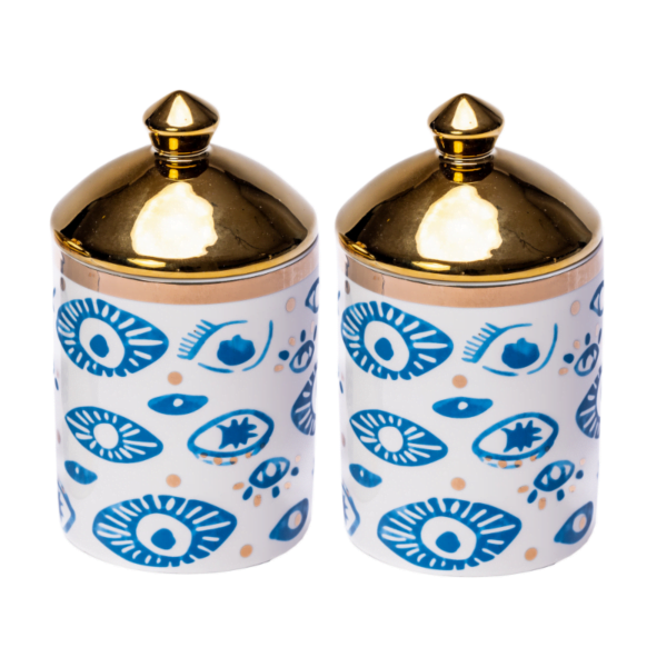 Two Evil Eye Canisters (Set of 2) with gold lids.