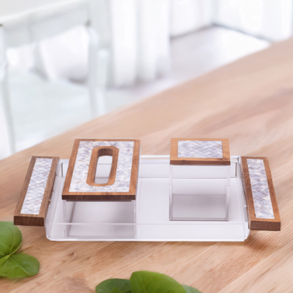 Premium acrylic and mother of pearl set, includes Tray, tissue box and a cube storage box sitting on a wooden table.