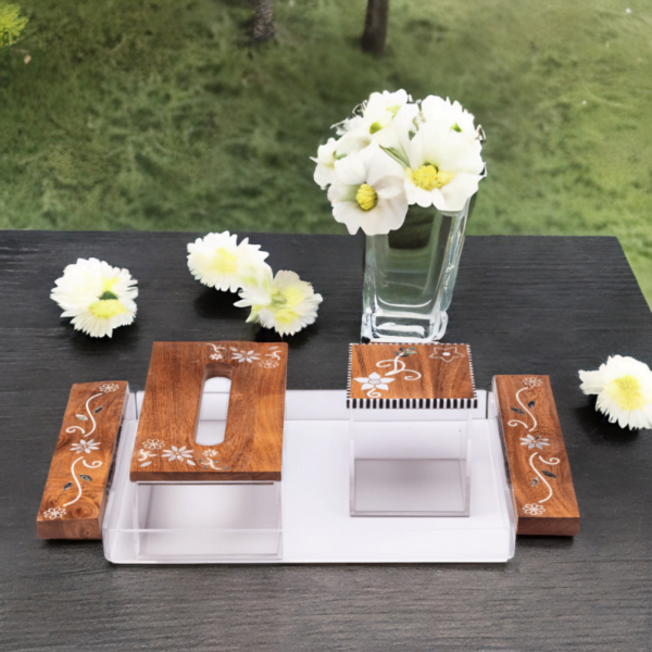 Premium Acrylic and Wood tray adorned with quality mother of pearl inlay, set consists of tray, tissue box and storage box styled with artistic flower pattern sitting on table with flower vase.