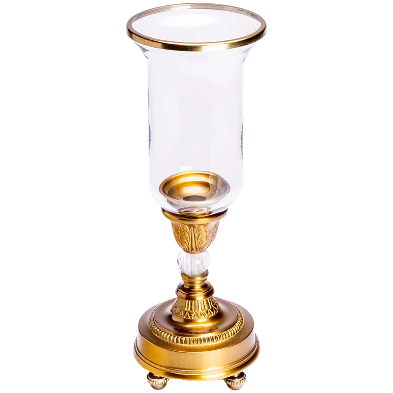 A Candle Holder in Gold with Antique Styling.