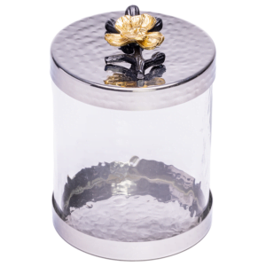 A Small Canister with Black and Gold Flower Lid.