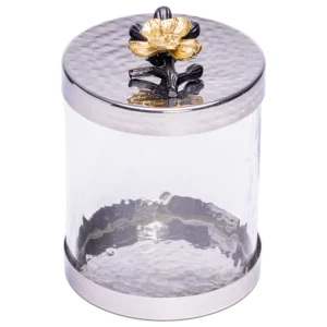A Small Canister with Black and Gold Flower Lid.