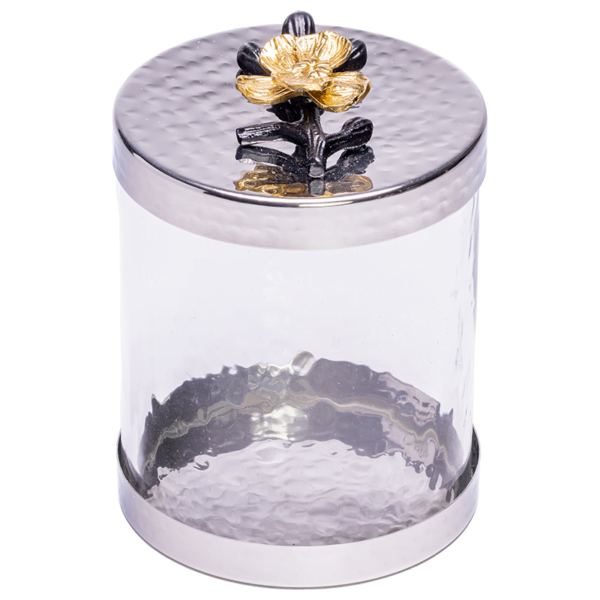 A Small Canister with Black and Gold Flower Lid.