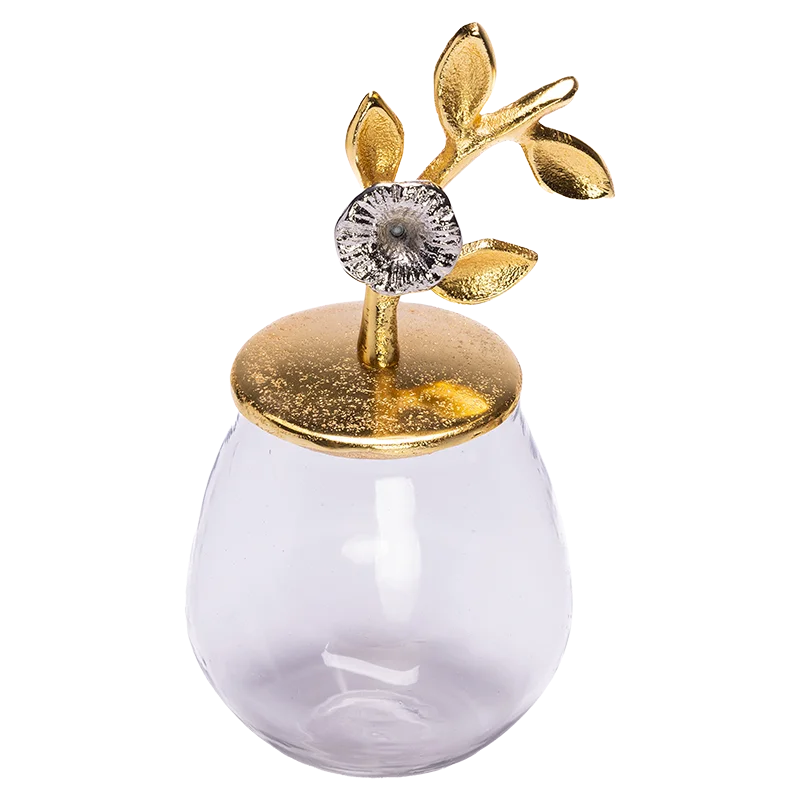 glass jar with gold flower lid