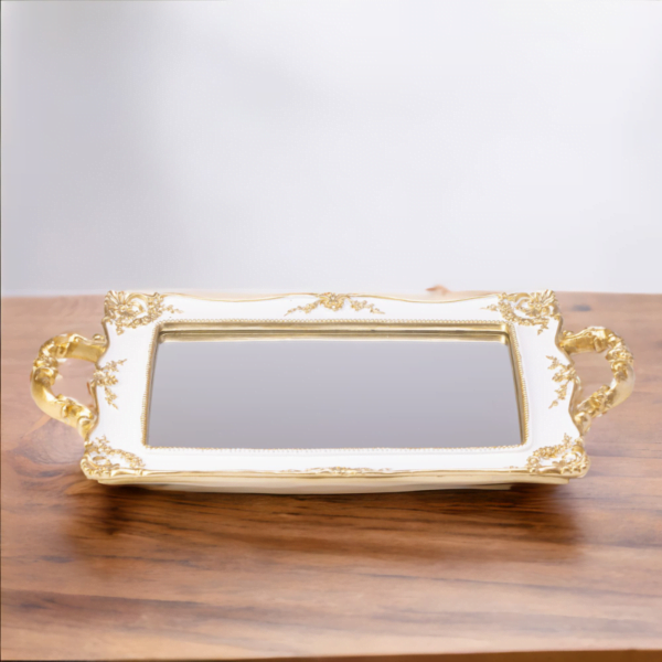 A French Mirror tray on a wooden table.
