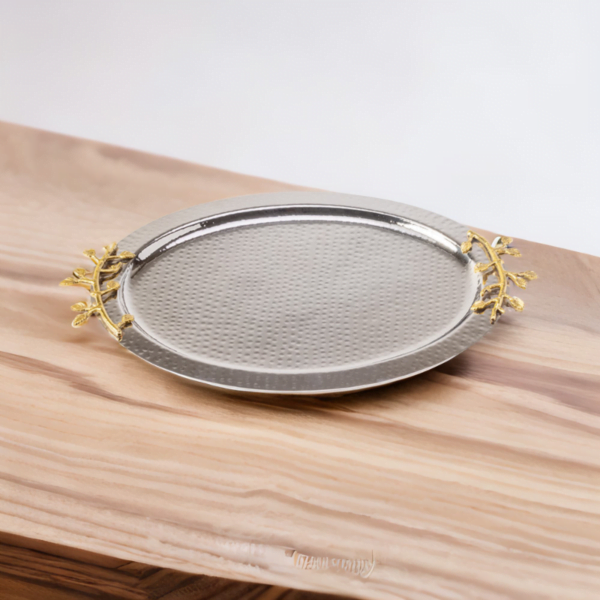 A Leaf Oval Tray on a wooden table.