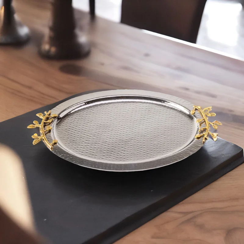 A Leaf Oval Tray sitting on top of a table.