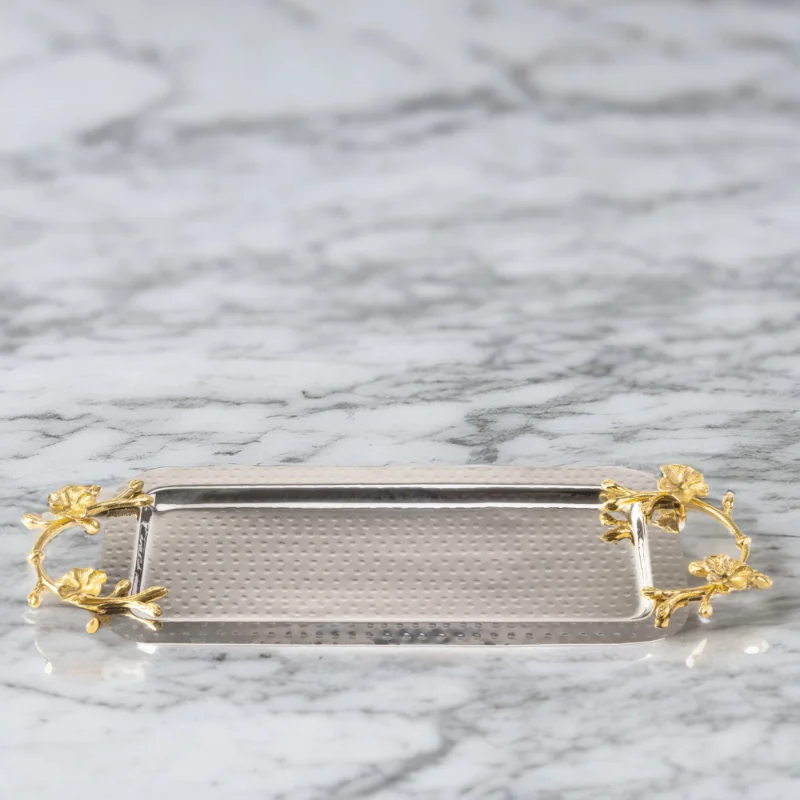 A Long Floral Tray on a marble surface.