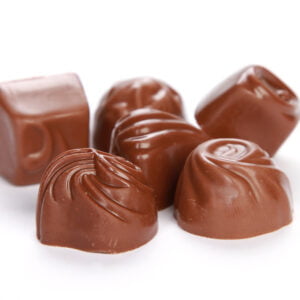 A closeup shot of chocolate candy isolated on a white background