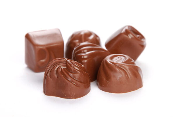 A closeup shot of chocolate candy isolated on a white background