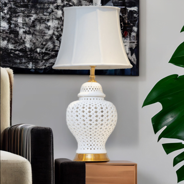 White Ginger Jar Lamp with white shade on a living room side table.