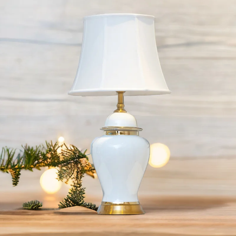 A Golden Glow Lamp on a wooden table.