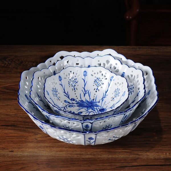 3 different sized round hand painted white and blue china set