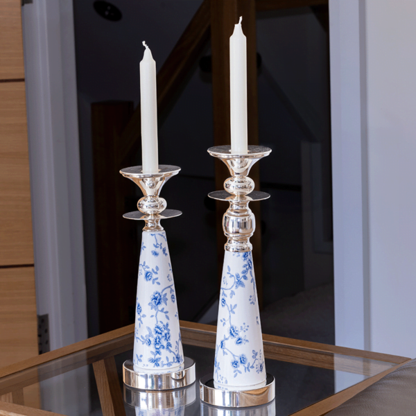 a pair of Alice Silver Candle Holders