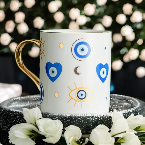 An Azure Heart Mug with an evil eye on it.