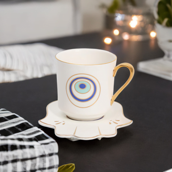 A Serenity Set cup and saucer on a table.