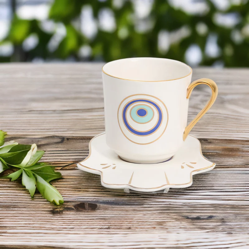 A Serenity Set with an evil eye on it sits on a wooden table.
