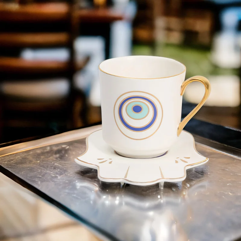 A Serenity Set with an evil eye on it sits on a table.