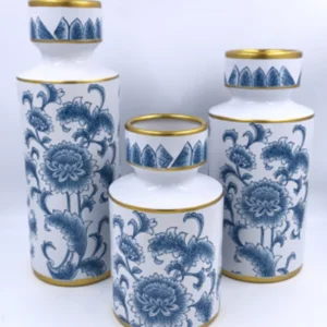 3 blue and white porcelain vases with gold accents.