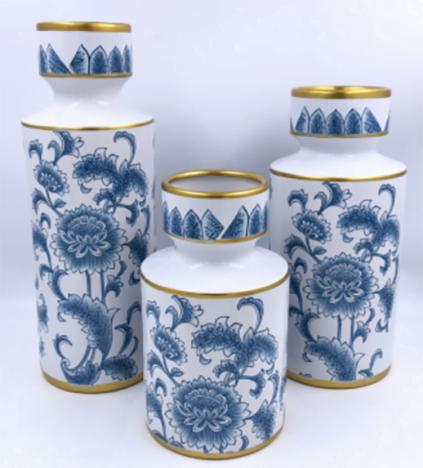 3 blue and white porcelain vases with gold accents.