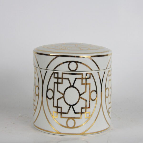 large ceramic canister with gold accents