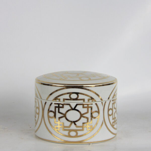 medium ceramic canister with gold accents