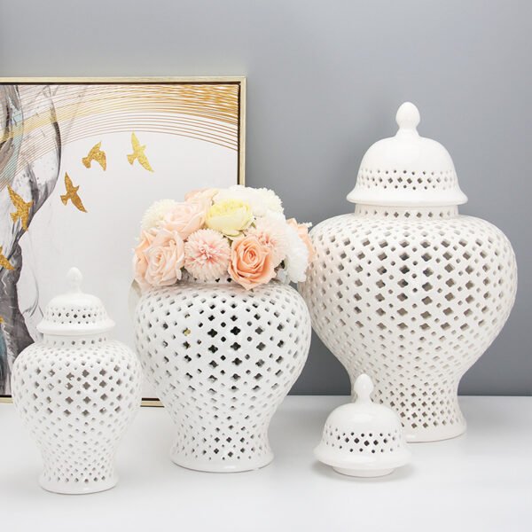3 white ginger jars with flowers