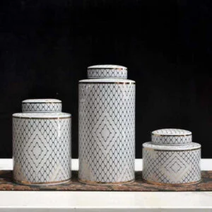 3 jar set diffrent sizes with matching lids, elegent mix of white and black colors to elevate your home decor, and gold egges