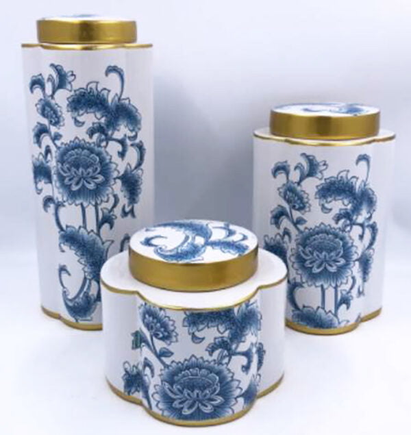 3 white and blue porcelain jars with gold accented lids