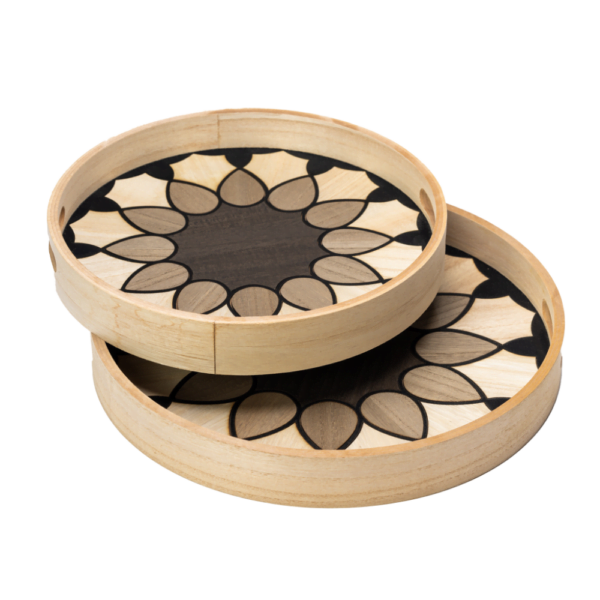 Two wooden serving trays on top of each other with mosaic flower pattern