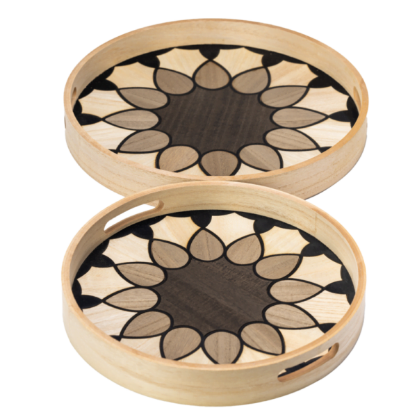 Two wooden serving trays in front of each other with mosaic flower pattern