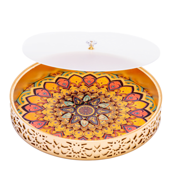 A vibrant gold decorative tray with an intricate and colourful design with frosted lid.