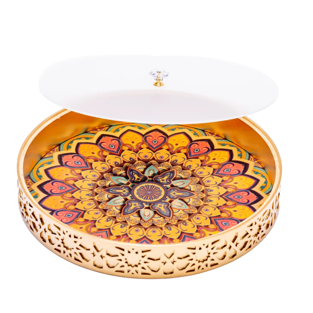 A vibrant gold decorative tray with an intricate and colourful design with frosted lid.