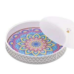 a white decorative tray with frosted white lid.