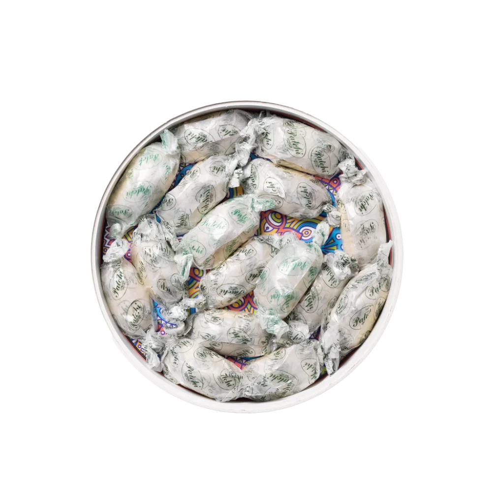 a white decorative tray filled with ramadan sweets.