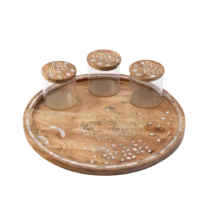 round wooden tray with 3 canisters adorned with mother of pearl inlay.