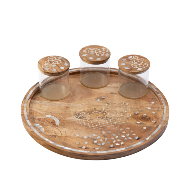 round wooden tray with 3 canisters adorned with mother of pearl inlay.