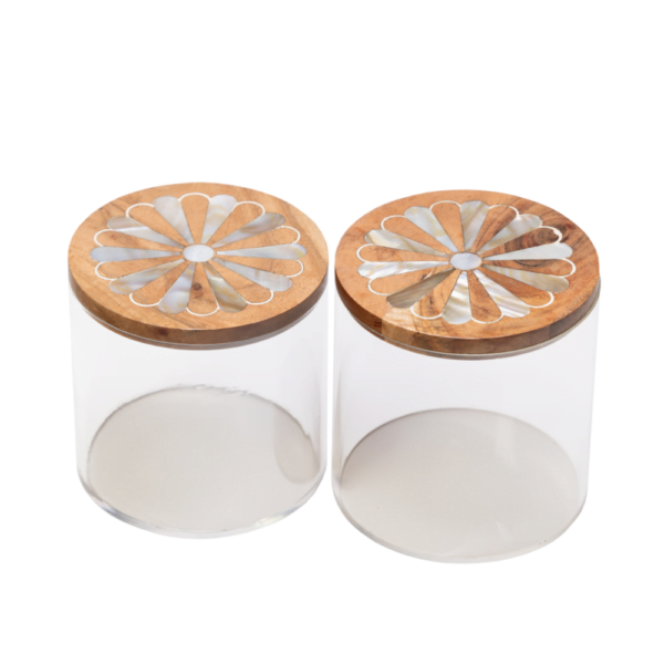 two acrylic and wood canisters with mother of pearl inlay.
