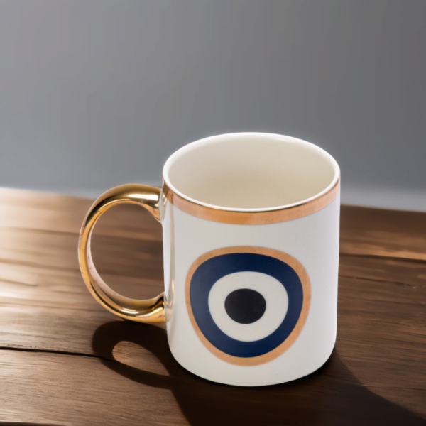 Evil Eye Ceramic Mug on table