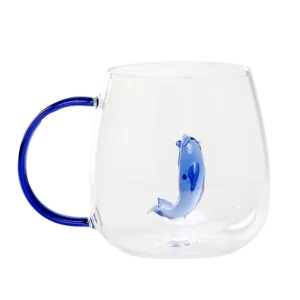 Glass cup with blue handle and 3D blue dolphin inside