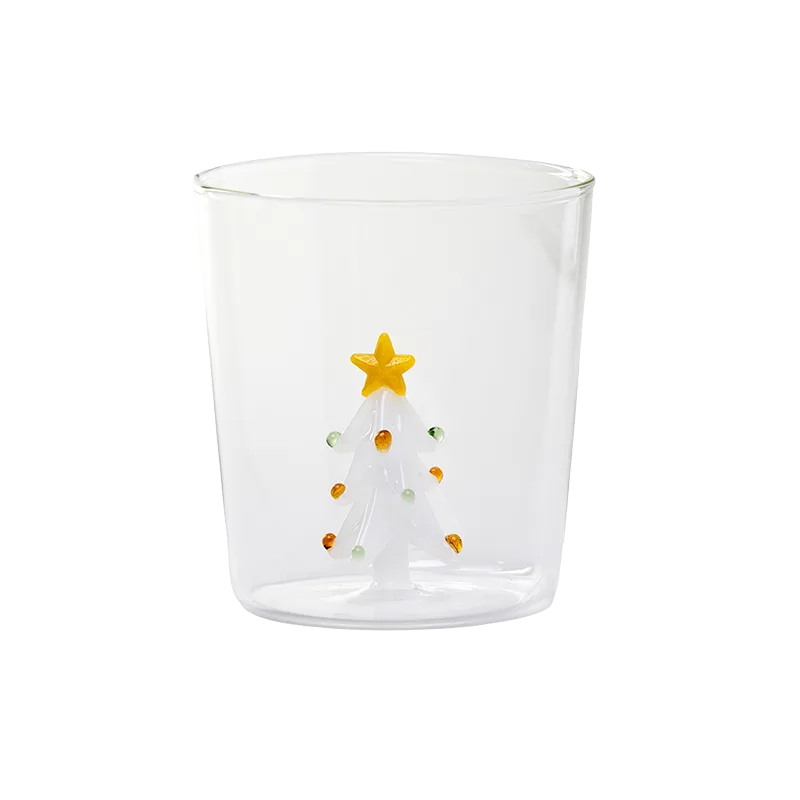 Glass cup with 3D white Christmas tree inside.