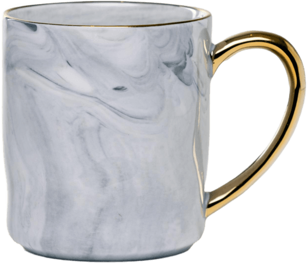 Ceramic mug with a granite look and a golden handle.