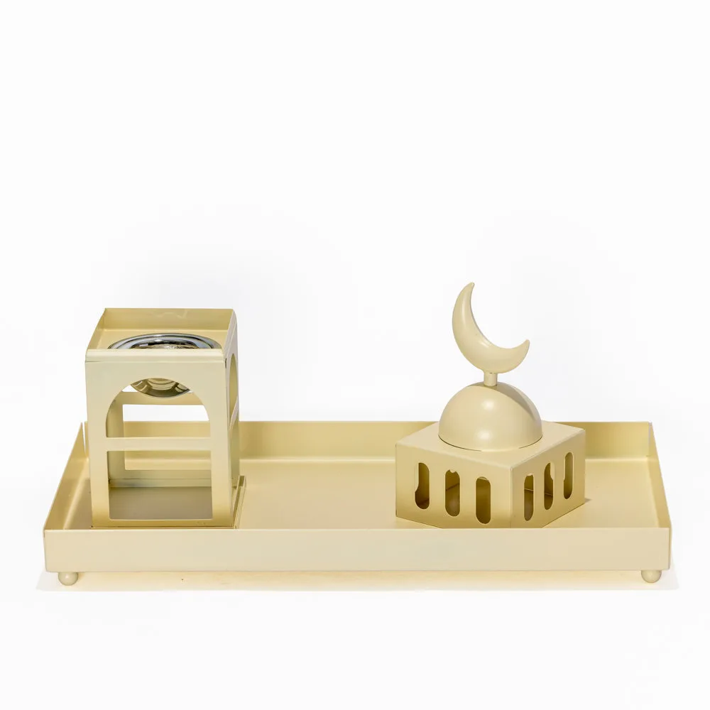 Cream metal modular incense burner set that transforms from a stacked mosque silhouette into a separate tray and burner station. disassembled.